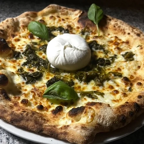 Pizza mit Friarielli (neapolitanischer Stängelkohl) und Burrata Pizza Friarielli und Burrata frisch aus dem Holzofen - Trattoria Gusto Da Davide e Hind